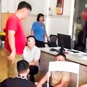 Công an khống chế nhóm người khi tới một văn phòng công chứng tại Bình Dương